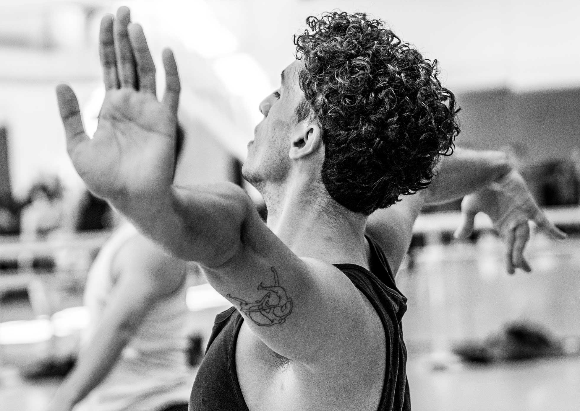 Close-up of a dancers with his arms spread