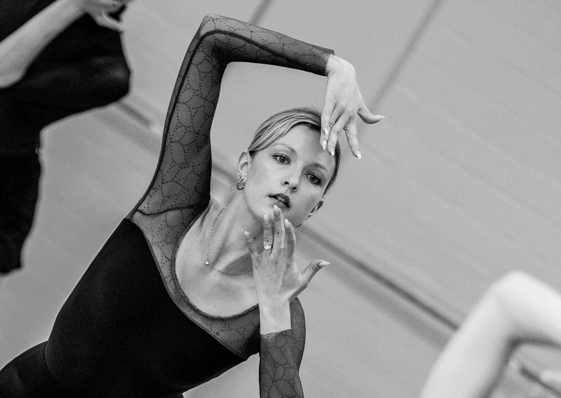 Ballerina gesturing before her face