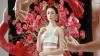 Woman with red flowers