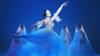 Balletdancer in a white tutu, blue lighting